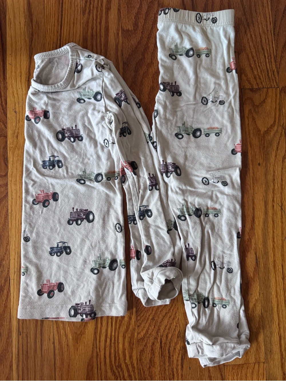Kyte BABY Cream Pajama Set with Multi-Color Tractor Print